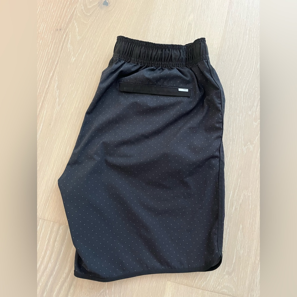 Vuori Black Athletic Shorts with Subtle Dot Pattern and Red Zip Accent - Picture 2 of 2